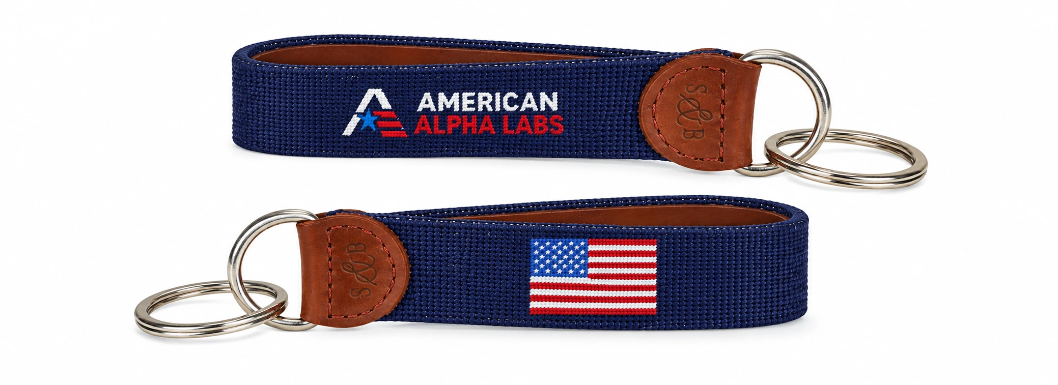 Navy American Alpha Labs keychain wristlet with the AAL logo and American flag